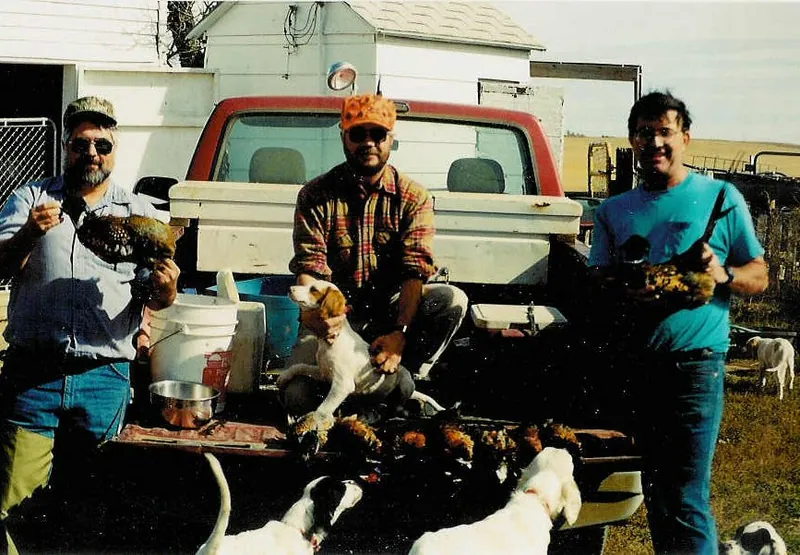 Puppies with pheasants