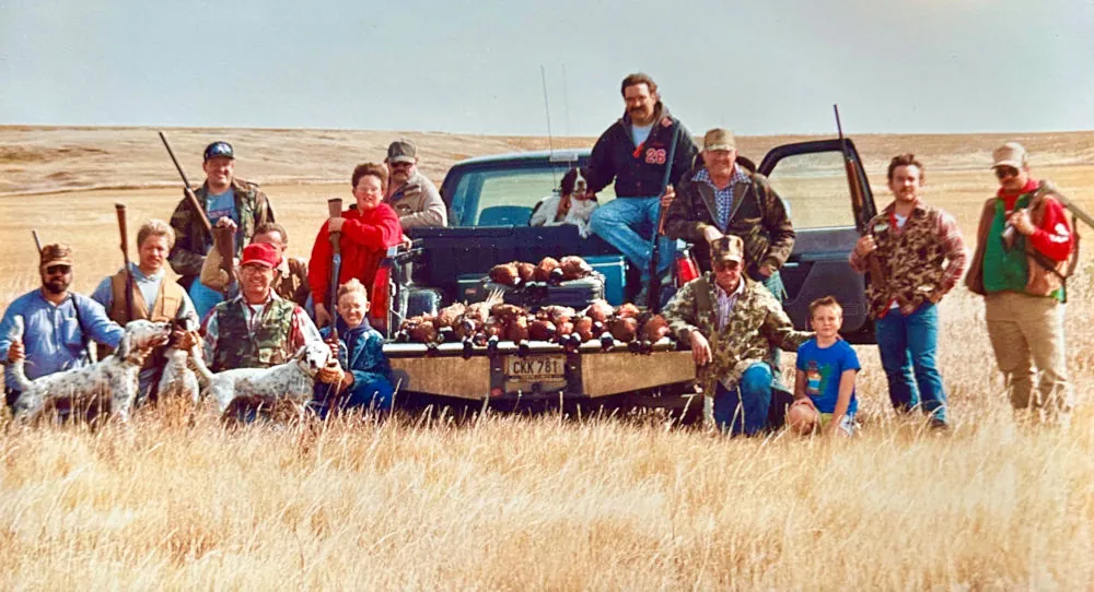 Hunters, bird dogs and a pickup full of wild roosters on opening day of pheasant season 1993 at the Schorsch farm